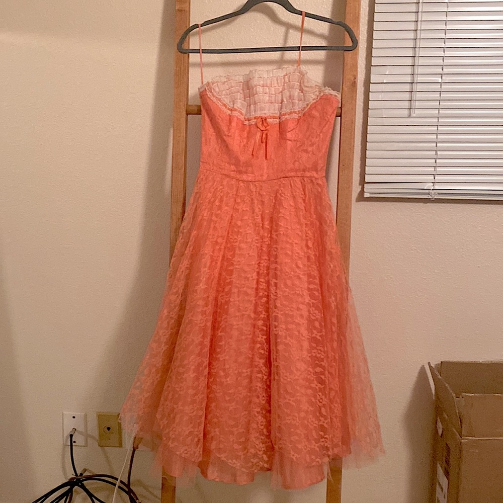 Unique extra small peach lace dress with zip up back. Purchased at antique shop.